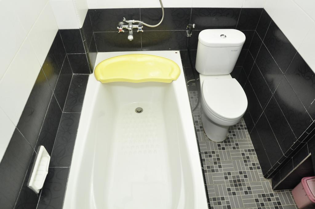 Hotel Andhika Syariah Samarinda Quarto foto