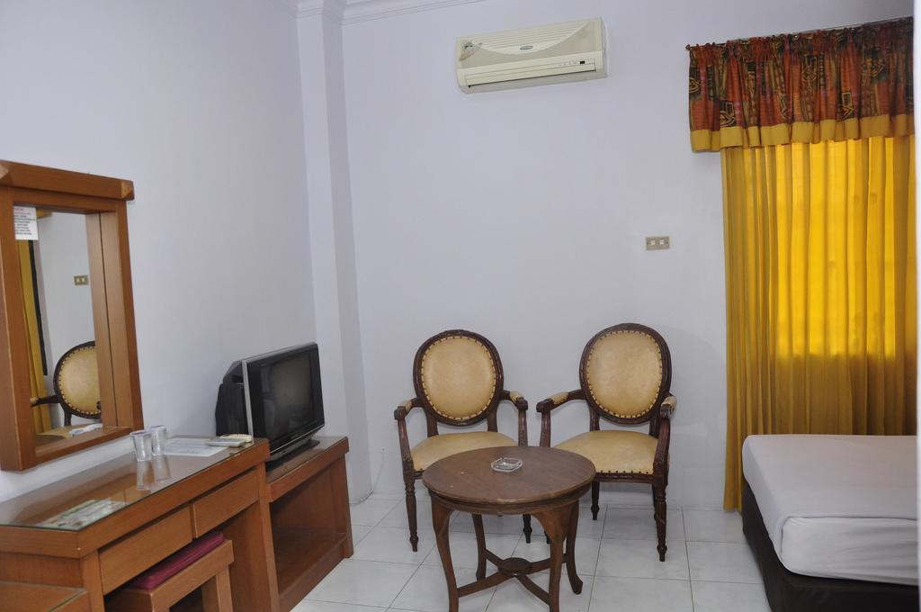 Hotel Andhika Syariah Samarinda Quarto foto