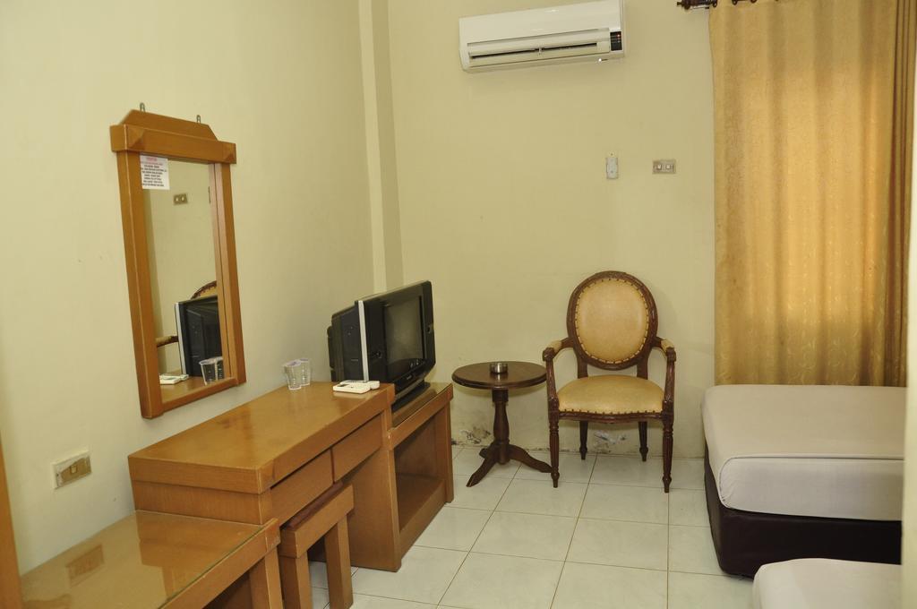 Hotel Andhika Syariah Samarinda Quarto foto