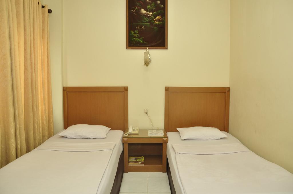Hotel Andhika Syariah Samarinda Quarto foto