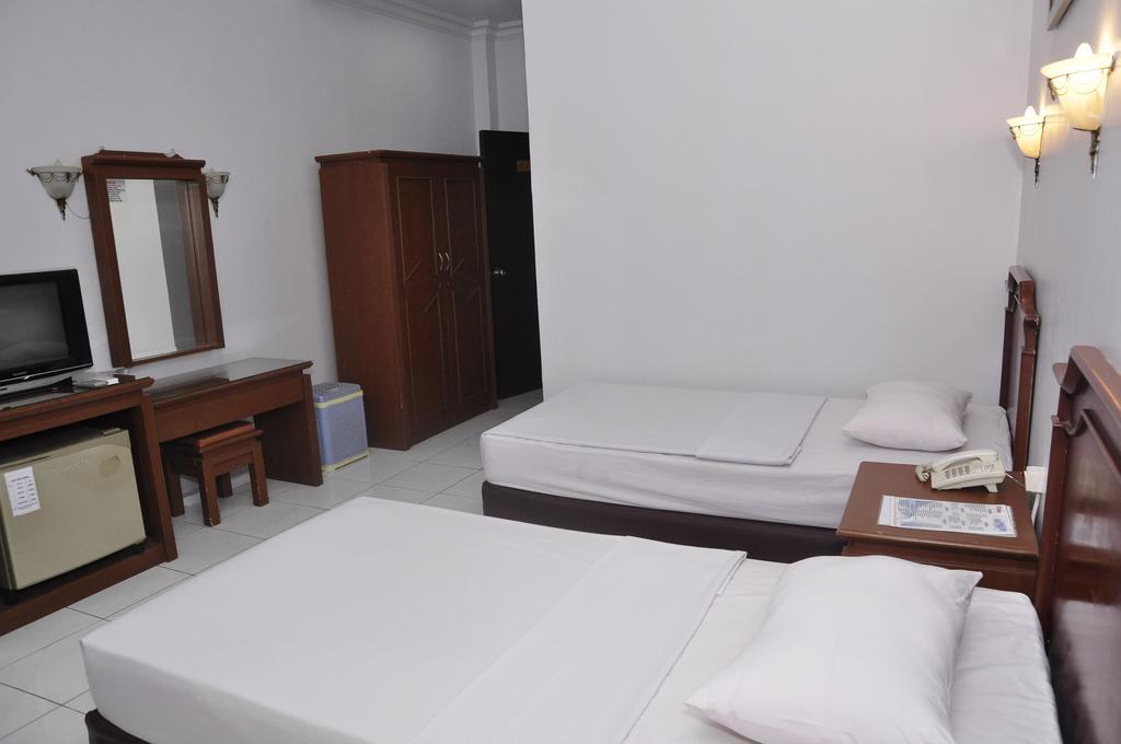 Hotel Andhika Syariah Samarinda Quarto foto
