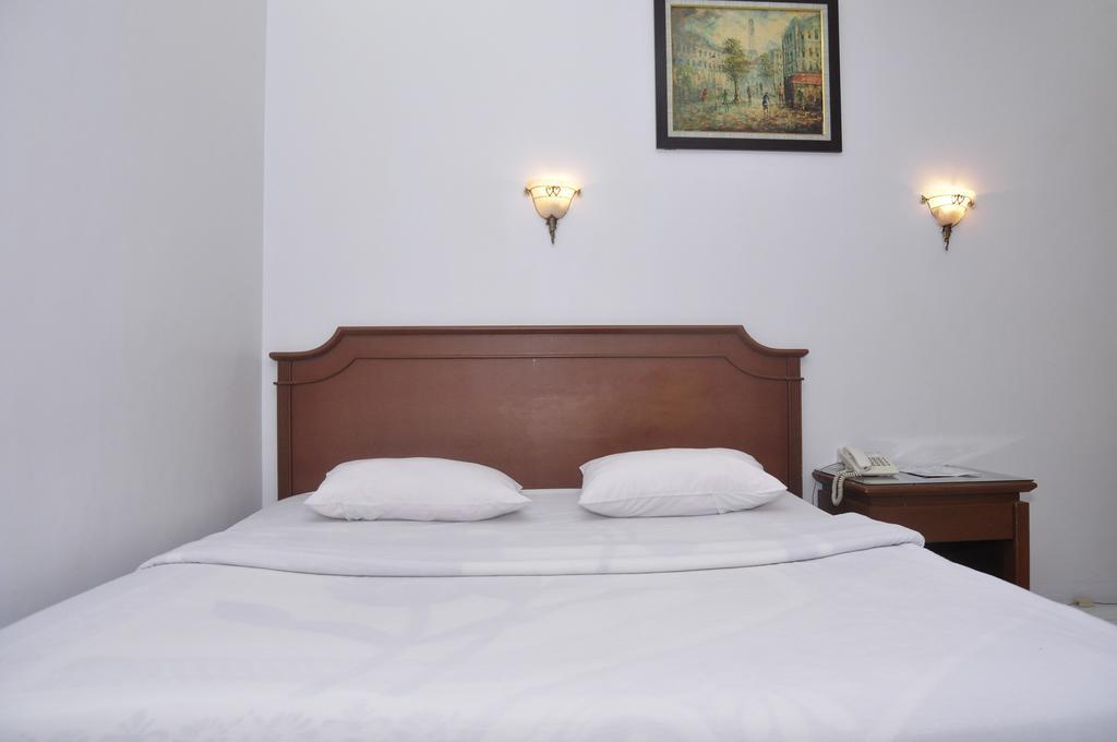 Hotel Andhika Syariah Samarinda Quarto foto