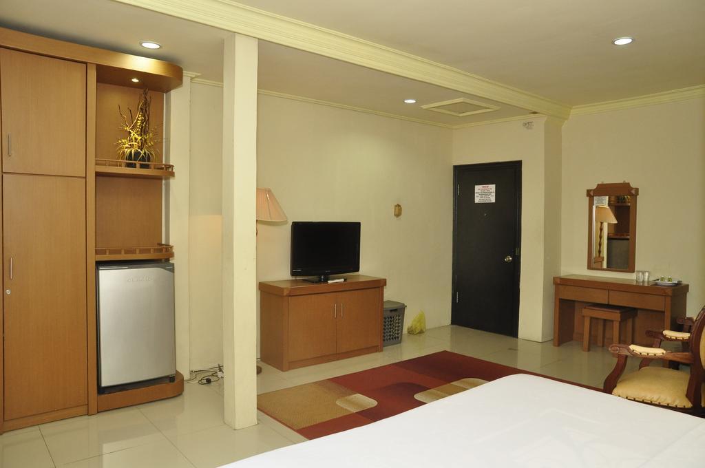 Hotel Andhika Syariah Samarinda Quarto foto